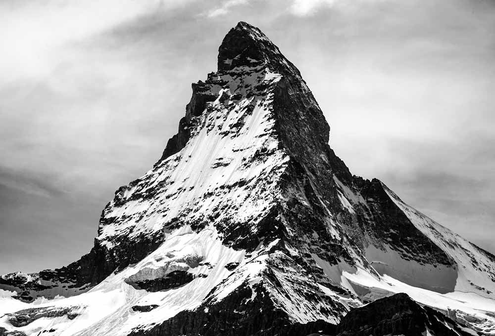 Afbeelding van een berg, geeft de top weer.